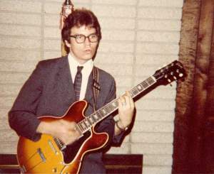 Playing a neighbor's Gibson arch-top 1980s